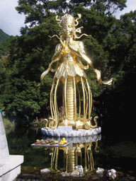 Statue of Dongba human god at Jade Water Village