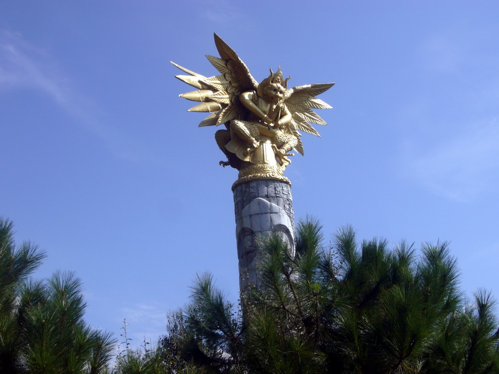 Statue of Dongba nature god at Jade Water Village