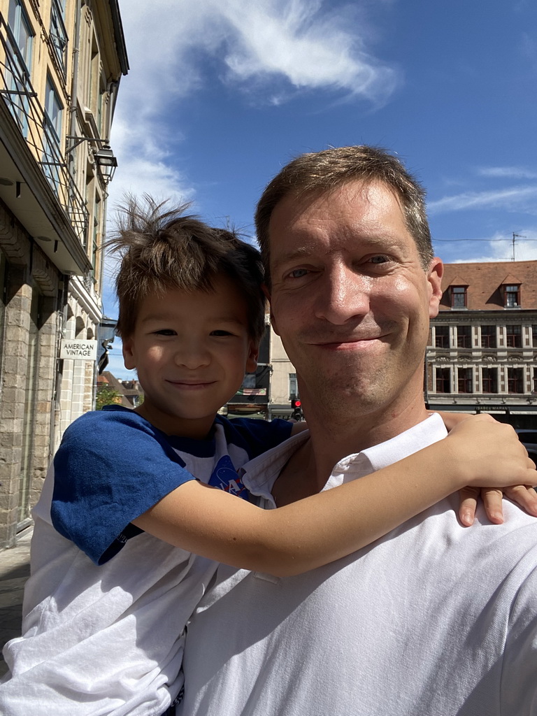 Tim and Max at the Place du Lion d`Or square