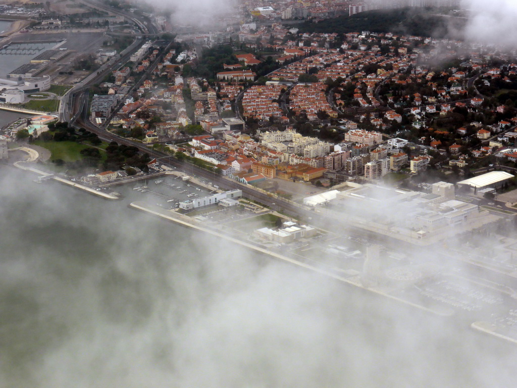 The Belém district of Lisbon, with the Torre de Belém tower, the Museu do Combatente museum, the fishing dock, the Belém Cultural Center and the Monument to the Discoveries (Padrão dos Descobrimentos), viewed from the airplane from Amsterdam