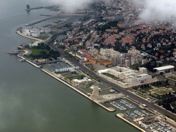 The Belém district of Lisbon, with the Torre de Belém tower, the Museu do Combatente museum, the fishing dock, the Belém Cultural Center and the Monument to the Discoveries, the Jerónimos Monastery and the Parque da Praça do Império park, viewed from the airplane from Amsterdam