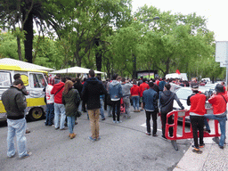 Fans of the S.L. Benfica soccer team watching the championship game on a screen at the Avenida da Liberdade avenue