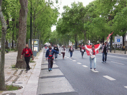 Fans of the S.L. Benfica soccer team celebrating the championship at the Avenida da Liberdade avenue