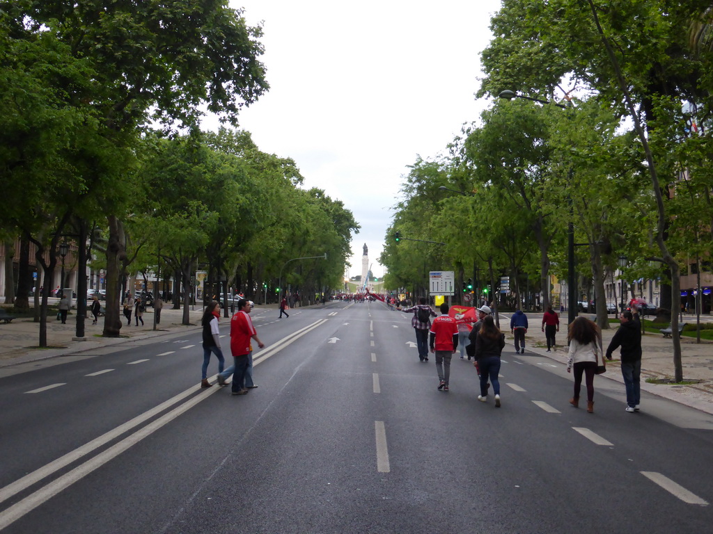 Fans of the S.L. Benfica soccer team celebrating the championship at the Avenida da Liberdade avenue, with a view on the Praça do Marquês de Pombal square with the statue of the Marquess of Pombal