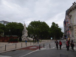 Fans of the S.L. Benfica soccer team celebrating the championship at the Avenida da Liberdade avenue, and the Monumento aos Mortos da Grande Guerra monument