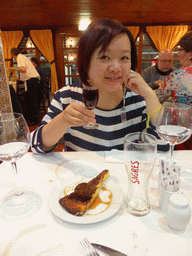 Miaomiao with port wine and cake at the A Gina Restaurant