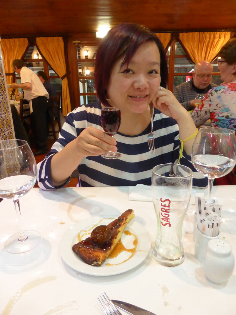 Miaomiao with port wine and cake at the A Gina Restaurant