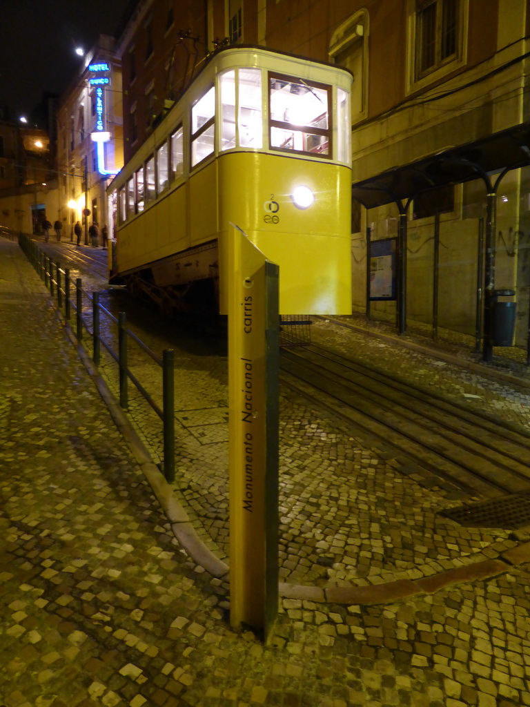 The Glória Funicular (Elevador da Glória) at the Calçada da Glória street, by night