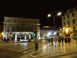 The Praça Dom João da Câmara square with the west side of the National Theatre D. Maria II, with a view on the Rossio Square and the São Jorge Castle, by night