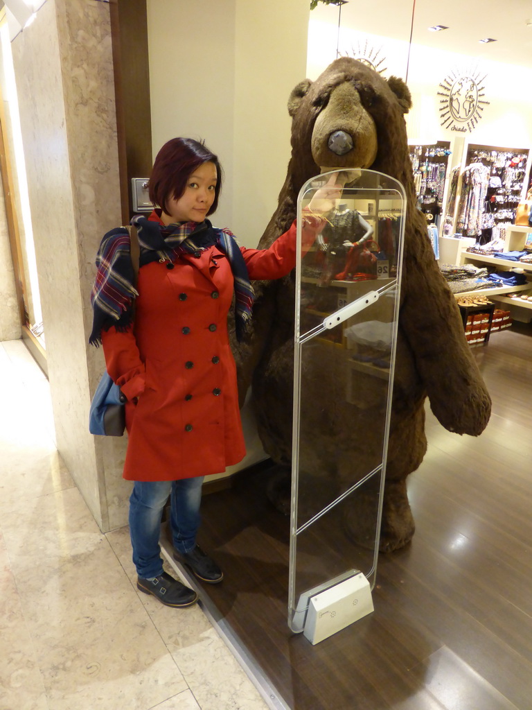 Miaomiao with a stuffed bear in a shop in the Armazéns do Chiado shopping mall