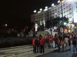 Fans of the S.L. Benfica soccer team celebrating the championship at the Praça do Marquês de Pombal square, by night