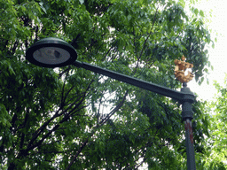 Street lantern with a scale model of a Portuguese ship, at the Avenida da Liberdade avenue