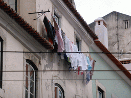 Laundry hanging outside a house at the Travessa da Condessa do Rio staircase