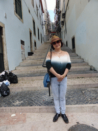 Miaomiao at the Calçada da Bica Grande staircase, viewed from the Rua de São Paulo street