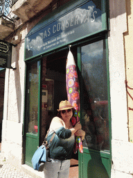 Miaomiao in front of the Loja das Conservas shop at the Rua do Arsenal street