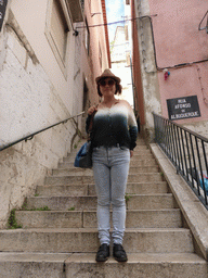 Miaomiao at a staircase at the Rua Afonso de Albuquerque street