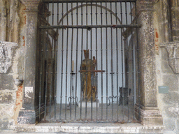 Chapel behind a gate with a statue at the Cloister of the Lisbon Cathedral