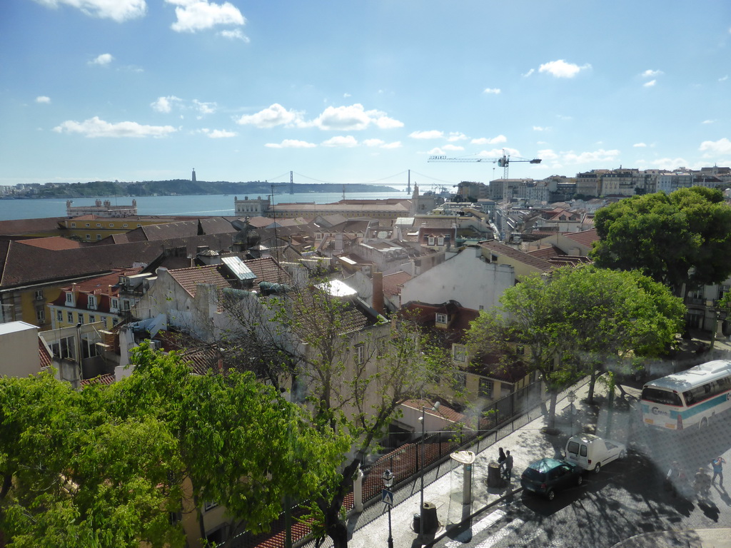 The southwest side of the city with the Ponte 25 de Abril bridge over the Rio Tejo river and the Cristo Rei statue, viewed from the upper floor of the Lisbon Cathedral