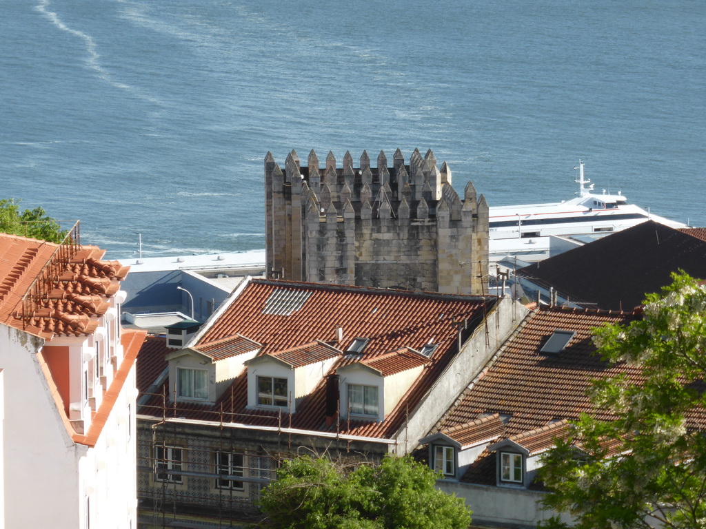 The towers of the Lisbon Cathedral at the south side of the city and the Rio Tejo river, viewed from the Praça d`Armas square at the São Jorge Castle
