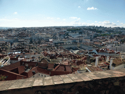 The city center with the Praça de Figueira square, the Rossio Square and the Rossio Railway Station, viewed from the ruins of the former Royal Palace of the Alcáçova at the São Jorge Castle