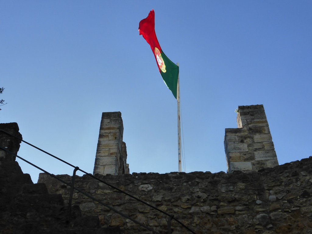 Portuguese flag at one of the western towers of the São Jorge Castle