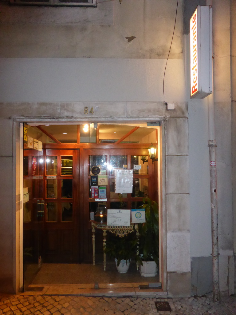 Front of the Restaurante Alto Minho at the Rua Santa Marta street, by night