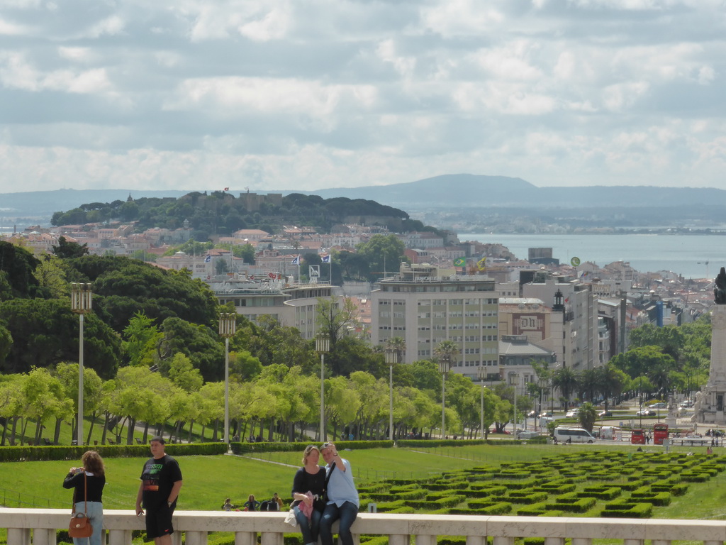 The Parque Eduardo VII park, the Praça do Marquês de Pombal square with the statue of the Marquess of Pombal, the São Jorge Castle and the Rio Tejo river, viewed from the sightseeing bus at the Alameda Cardeal Cerejeira street