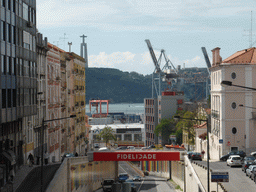 The Avenida Infante Santo avenue, the Rio Tejo river and the Cristo Rei statue, viewed from the sightseeing bus