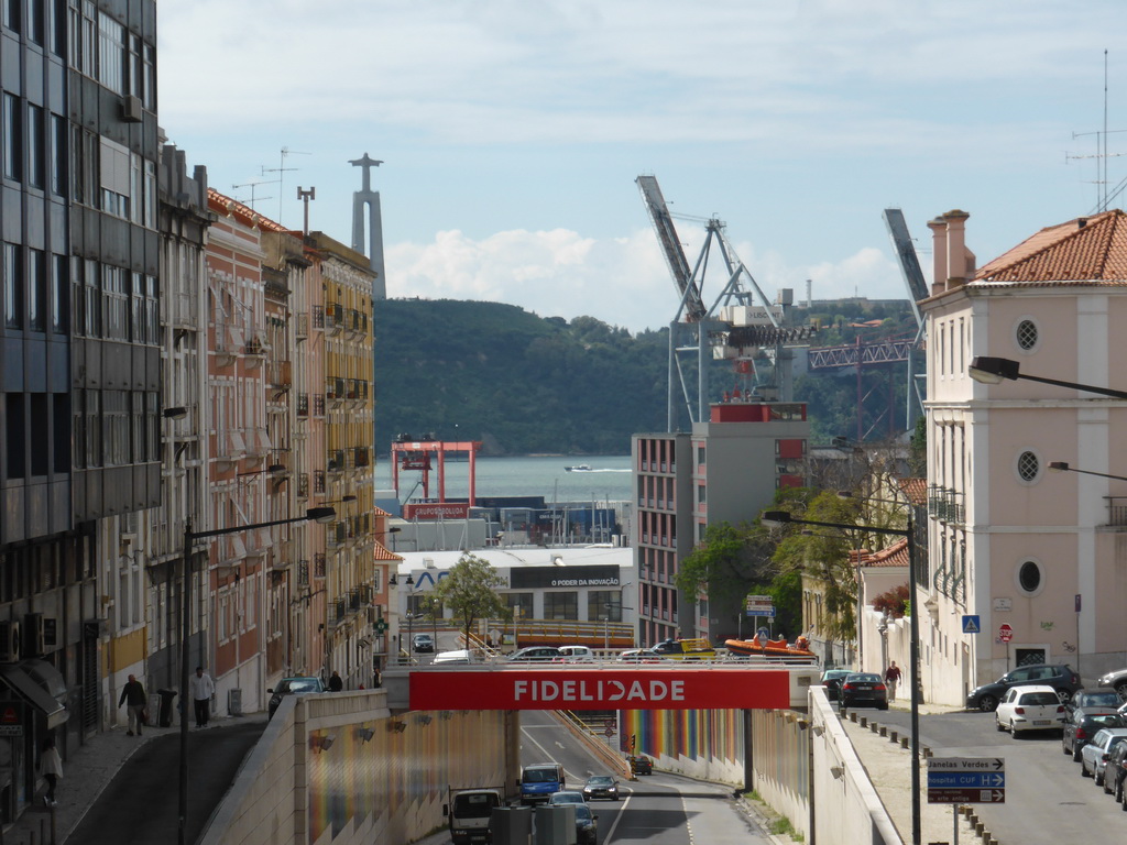 The Avenida Infante Santo avenue, the Rio Tejo river and the Cristo Rei statue, viewed from the sightseeing bus