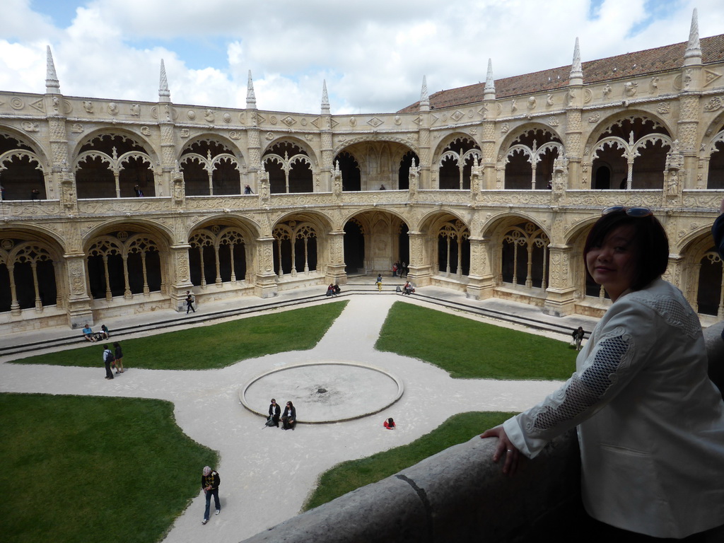 Miaomiao at the upper floor of the Cloister at the Jerónimos Monastery, with a view on the central square