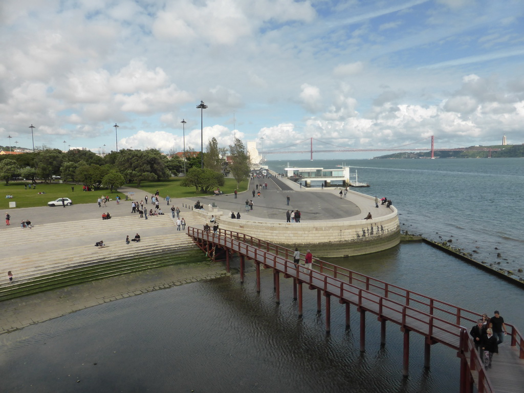 The coastline on the east side with the Padrão dos Descobrimentos monument, the Ponte 25 de Abril bridge over the Rio Tejo river and the Cristo Rei statue, viewed from the first floor of the Torre de Belém tower