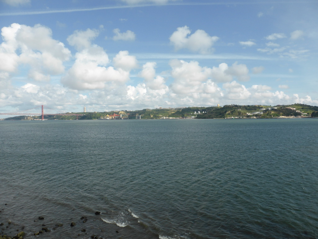 The Ponte 25 de Abril bridge over the Rio Tejo river and the Cristo Rei statue, viewed from the Loggia at the second floor of the Torre de Belém tower