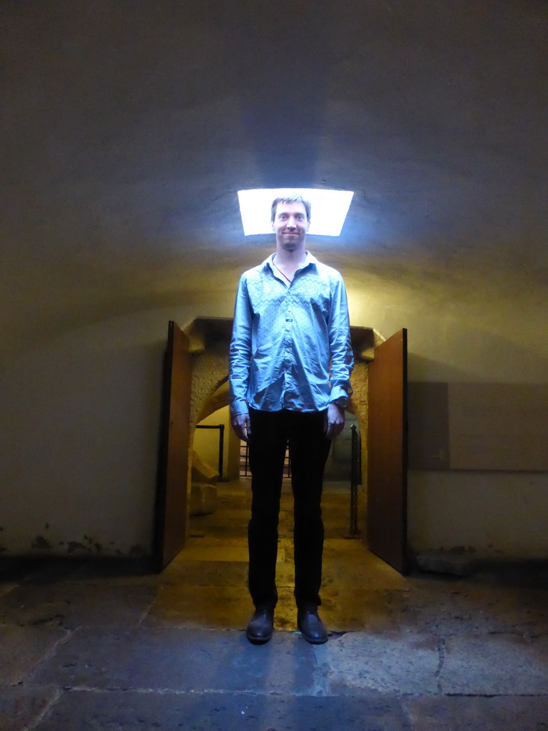 Tim in a prison cell in the basement of the Torre de Belém tower
