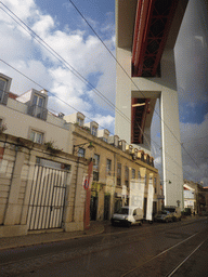 The Ponte 25 de Abril bridge over the Rua 1º de Maio street, viewed from the bus
