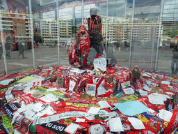 Statue of Eusebio covered with shawls in front of the Estádio da Luz soccer stadium