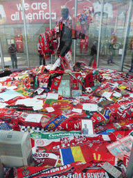 Statue of Eusebio covered with shawls in front of the Estádio da Luz soccer stadium