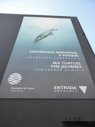 Poster on the temporary exhibit `Sea Turtles - The Journey` at the front of the Lisbon Oceanarium at the Parque das Nações park