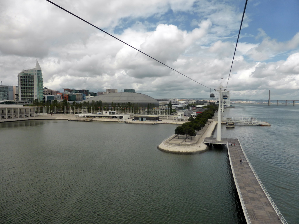 Dock, the Pavilhão de Portugal building, one of the towers next to the Vasco da Gama shopping mall, the Pavilhão Atlântico building and the Vasco da Gama Tower at the Parque das Nações park, and the Vasco da Gama Bridge over the Rio Tejo river, viewed from the funicular