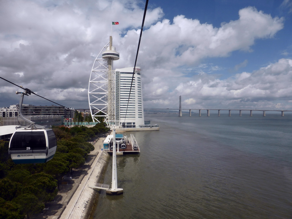 The Vasco da Gama Tower and the Jardins Garcia de Orta gardens at the Parque das Nações park, and the Vasco da Gama Bridge over the Rio Tejo river, viewed from the funicular