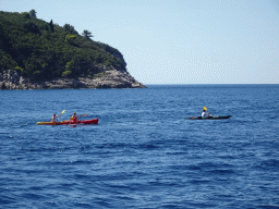 Canoes in front of Lokrum island, viewed from the ferry from Dubrovnik Harbour