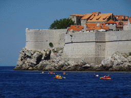 Canoes in front of the Old Town of Dubrovnik, viewed from the ferry from Dubrovnik Harbour