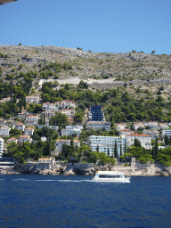 Boat in front of the east side of Dubrovnik, viewed from the ferry from Dubrovnik Harbour