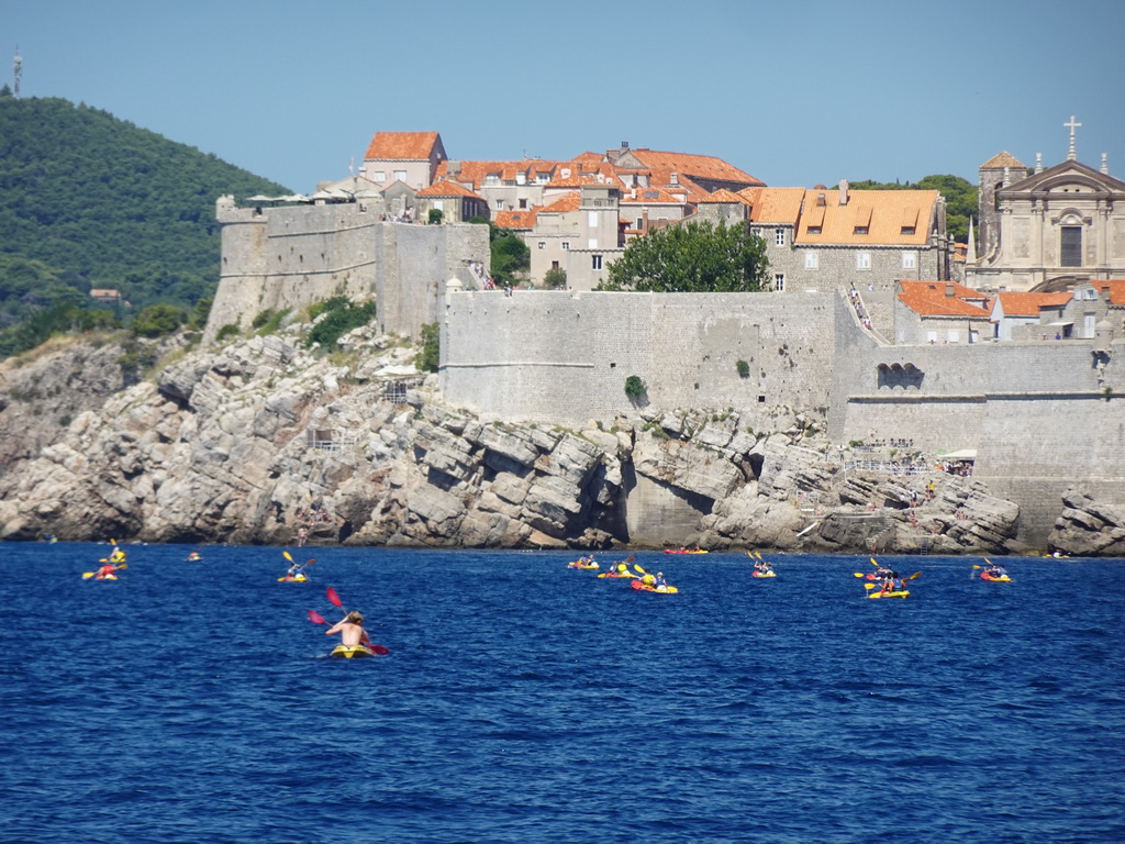 Canoes in front of the Old Town of Dubrovnik, viewed from the ferry from Dubrovnik Harbour