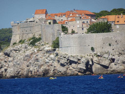 Canoes in front of the Old Town of Dubrovnik, viewed from the ferry from Dubrovnik Harbour