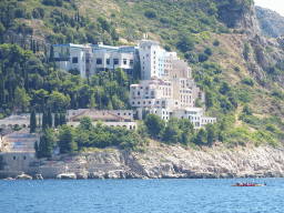 Canoes in front of Hotel Belvedere at the east side of Dubrovnik, viewed from the ferry from Dubrovnik Harbour