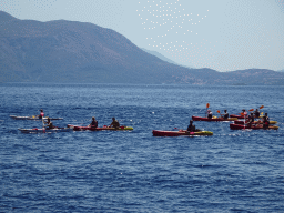 Canoes in front of the east side of Dubrovnik, viewed from the ferry from Dubrovnik Harbour
