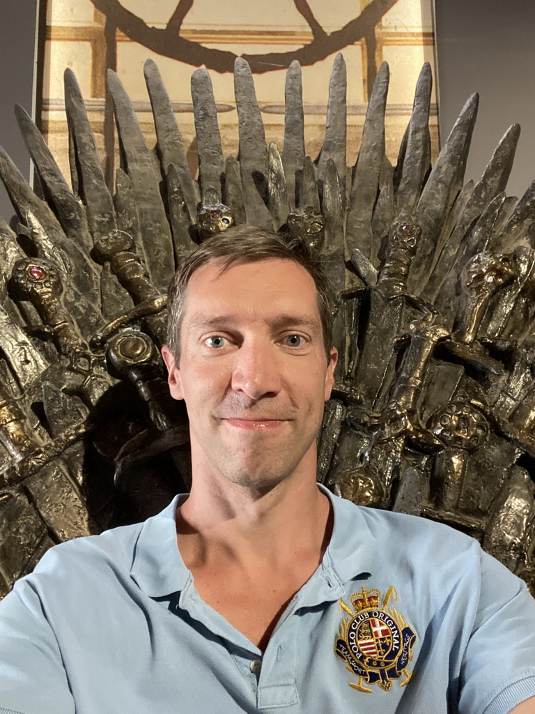 Tim on the Iron Throne from Game of Thrones at the Game of Thrones exhibition at the Lokrum Visitor Center at the southeast side of the Benedictine Monastery of St. Mary