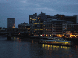 The Bankside and the Southwark Bridge over the Thames river, from the Millennium Bridge, by night