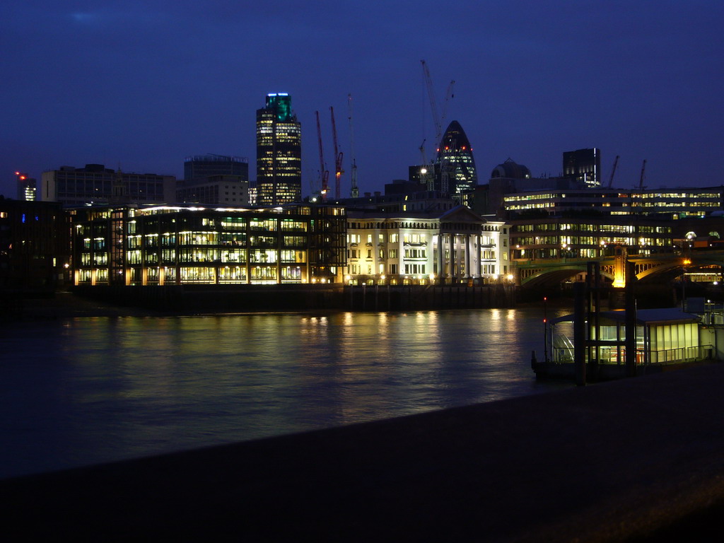 North shore of the Thames river, with Tower 42 and 30 St. Mary Axe, by night