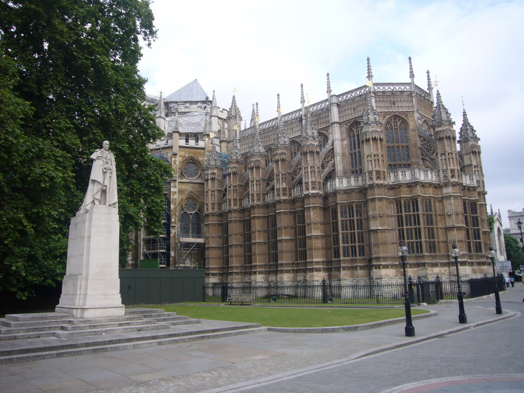 Statue of King George V and the back side of Westminster Abbey